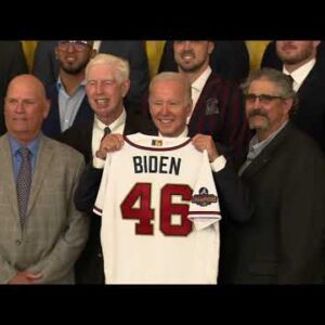 The Braves present President Biden with a custom World Series champions jersey at The White House
